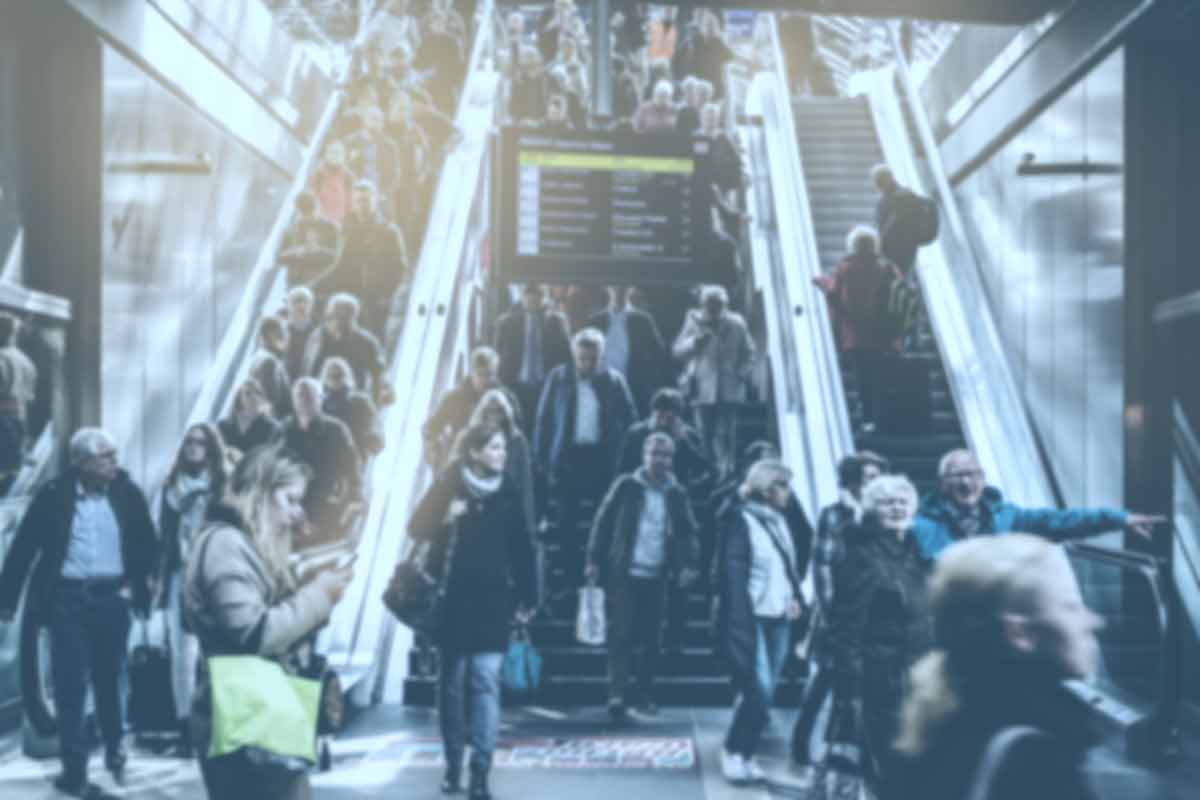 people traveling to subway platform